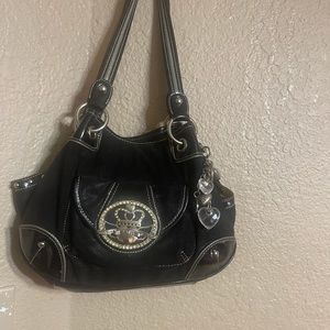 Kathy Van Zeland like new black and silver purse